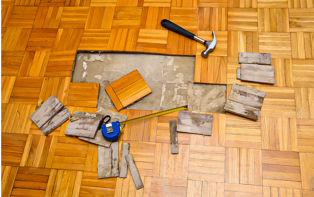 Parquet flooring repair before and after in Singapore home